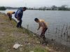 Polsek Sayung Bersihkan Sungai