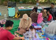 Tingkatkan Minat Baca Anak-anak, Perpustakaan Jalanan Ini Gelar Lapak Baca Buku Pakai Koper