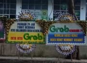 Protes Kebijakan “Akses Hemat”, Driver Kirim Karangan Bunga ke Kantor Grab Semarang