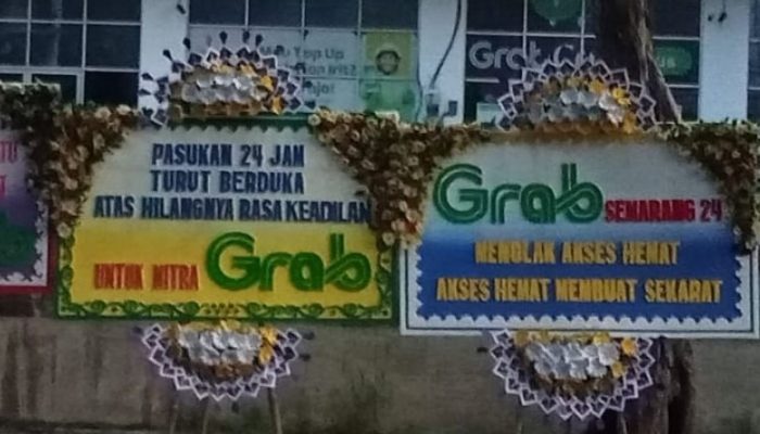 Protes Kebijakan “Akses Hemat”, Driver Kirim Karangan Bunga ke Kantor Grab Semarang
