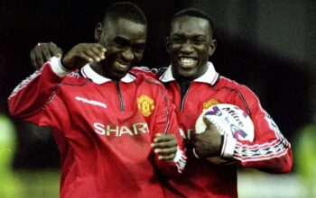 Kebersamaan legenda MU Andy Cole (sebelah kiri) dan Dwight Yorke (sebelah kanan)