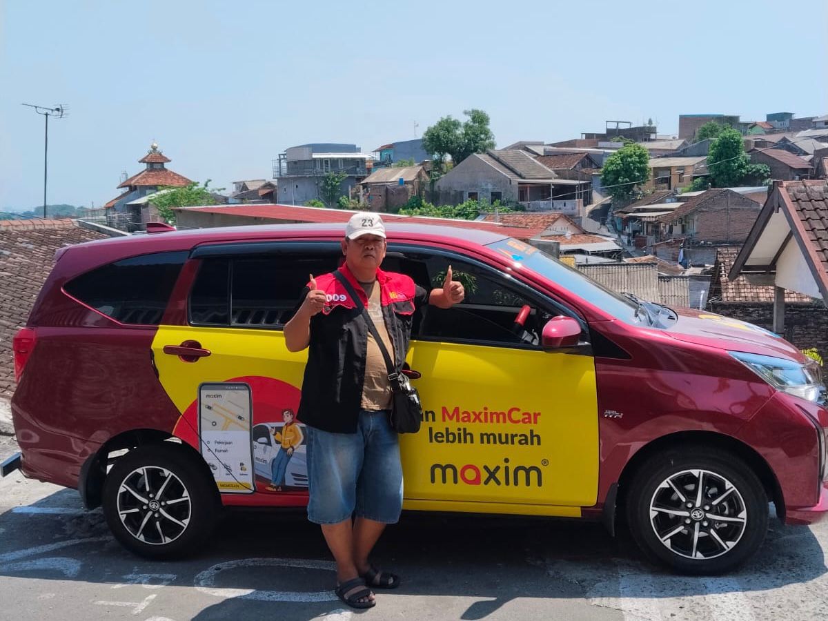 Ahmad Sholikin (61), mitra pengemudi Maxim yang berhasil raup Rp11 juta per bulan. (Dok.)