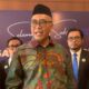 Ketua Umum DPP Dewan Pergerakan Advokat Republik Indonesia (DePA-RI), Luthfi Yazid (tengah)