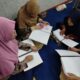 Semangat penyandang disabilitas netra saat belajar Al-Qur’an melalui huruf Braille. (Yuni Esa Anugrah/beritajateng.tv)