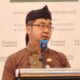 Kepala Bidang (Kabid) Pemerintahan dan Pembangunan Manusia Bappeda Jawa Tengah, Johan Hadiyanto, saat memberikan sambutan dalam acara Regional Policy Roundtable di Hotel Ibis Style, Kota Semarang, Selasa, 21 April 2026. (Made Dinda Yadnya Swari/beritajateng.tv)